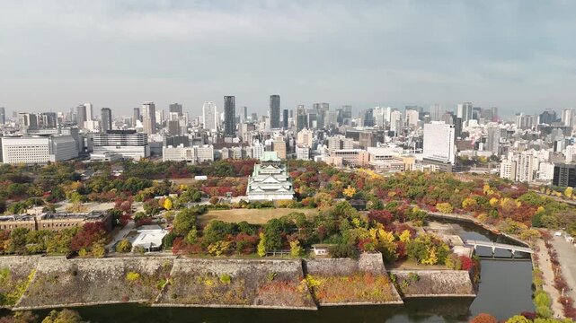 Osaka Castle, Chuo Ward, Osaka, Japan: 4K Aerial Drone Footage of Osaka Castle Park, Moat, Autumn Foliage, Historic Landmark, Japanese Architecture, City Skyline, Urban Landscape, O and Neya River