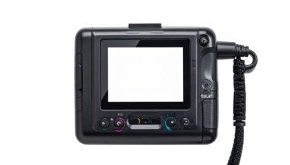 Back view of a digital camera, featuring a blank white screen and buttons, all set against a dark background