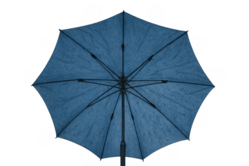 Blue umbrella protecting from wet weather, overhead view with raindrops creating abstract texture, transparent background