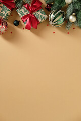Christmas gifts and ornaments border the top of a vertical beige background.