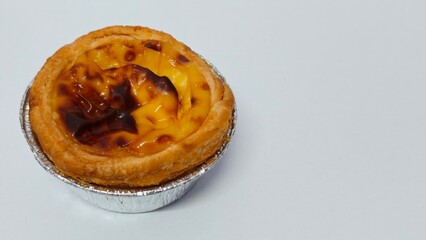 Closed up of Portuguese egg custard tart pastry. Pastel de nata with copy space