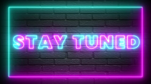 Stay Tuned Neon Text Sign Glowing on Dark Brick Wall Background