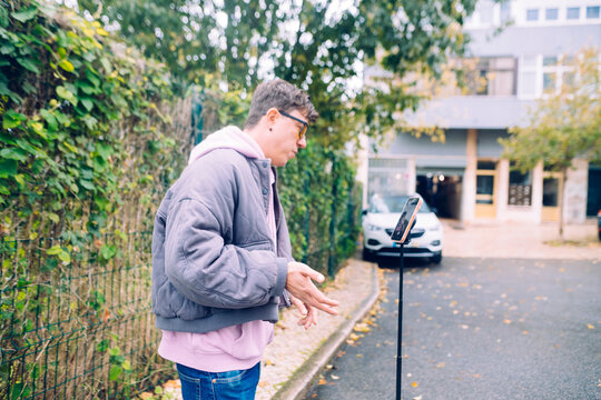 Male individual dressing appropriately for outdoor video shoot