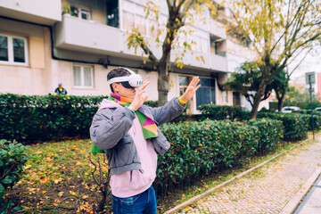 Person configuring digital reality gear amidst cityscape features