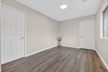 Spacious Bright Room With Decor, Open Room Featuring Skylight And Elegant Wooden Flooring Design