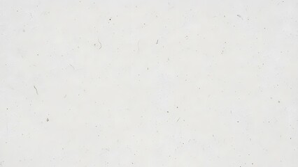 Close-up of a white textured surface with subtle imperfections and tiny dark specks, creating a minimalist background.