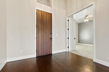 Simple Inviting Entrance, Elegant Entry With Durable Floors, Charming Foyer Leading To Bright Living Area