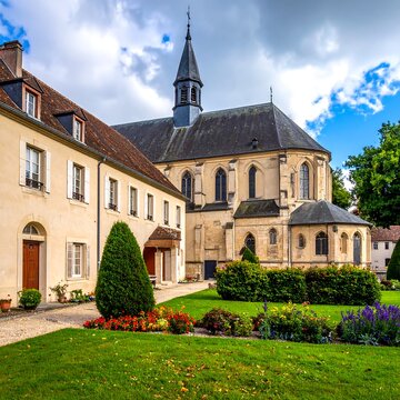 Picturesque Abbey of Pontigny - A Serene Architectural Landscape in France.