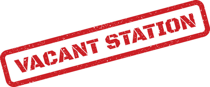 Textured red rubber stamp displaying the uppercase phrase Vacant Station for official notices and alerts