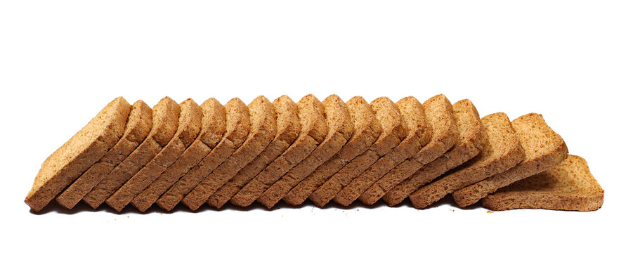 Pile rusks with wholewheat flour, sliced whole wheat dry rusk bread isolated on white background, side view