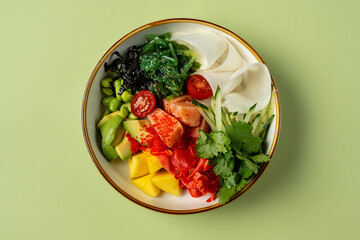 Brightly colored bowl offers a delightful mix of fresh vegetables, fruits, and specialty toppings, inviting a culinary adventure in every bite