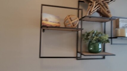 Contemporary Shelf With Decorations, Chic Modern Interior Setup Featuring Decorative Objects And Lighting