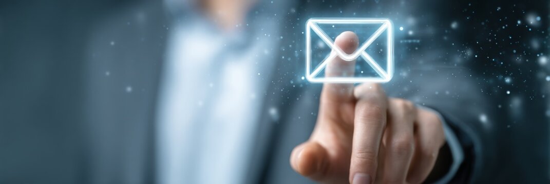 A Business Professional Interacting with a Digital Email Icon in a Modern Networking Environment