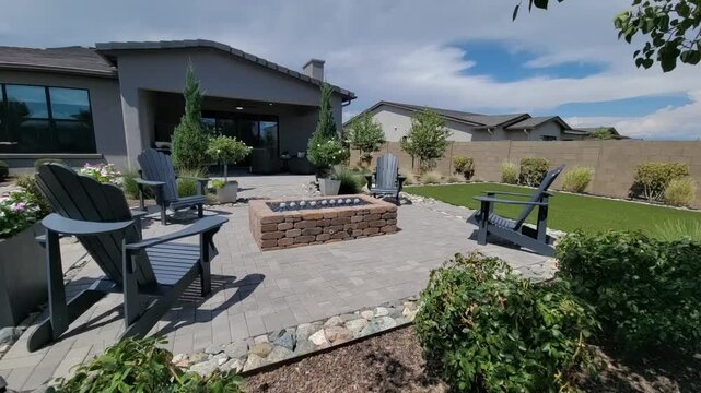 Outdoor Lounge Setup, Sunny Backyard With Fire Features, Patio Area With Seating And Firepit