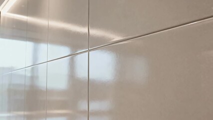 Closeup of a smooth texture finish on a modern wall highlighting its sleek polished surface ideal for minimalist interior designs.