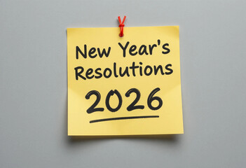 New year's resolutions 2026 on the sticky note isolated gray background. New year concept with typographic 2026. Motivational words for the new year 2026.