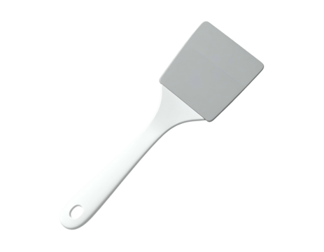 White handled grey head spatula, kitchen utensil on black background