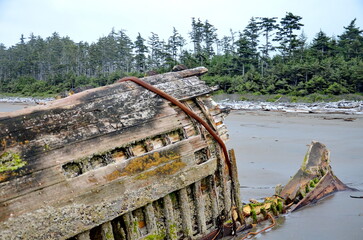 Small fishing boat shipwreck on the North beach-Rose Spit near Massett on Haida Gwaii, BC, Canada.