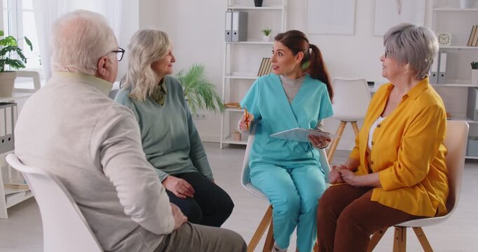 Speech therapy session, psychologist group talking activities for elderly with nurse, caregiver, carer support worker, active seniors, social recreational events, retirement house, retired sharing
