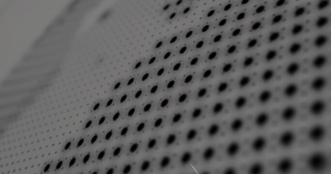 Showing perforated panel displaying diagonal holes at workbench, revealing matte finish scratches