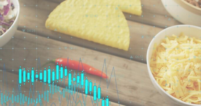 Showing white bowl of cheese on wooden board, tortilla chip, chili, slaw, blue overlay, copy space