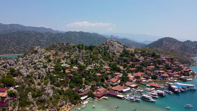 Aerial view of Simena Kalekoy coastal village and turquoise bay