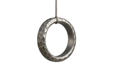 Hammered metal ring hanging from a rope, isolated on transparent background