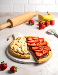 Sweet flatbread with sliced strawberries, bananas, and chocolate spread