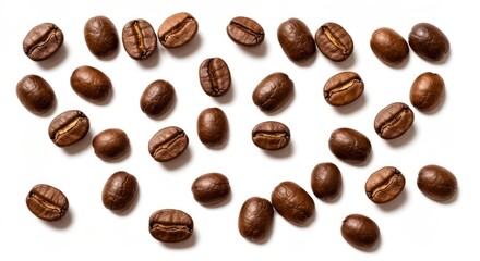 Obraz premium Roasted coffee beans scattered on a white surface, casting soft shadows