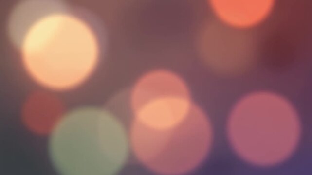 A colorful abstract background of glowing defocused Christmas lights creates a bright holiday bokeh with blurred shiny circles illuminated against the dark night city street
