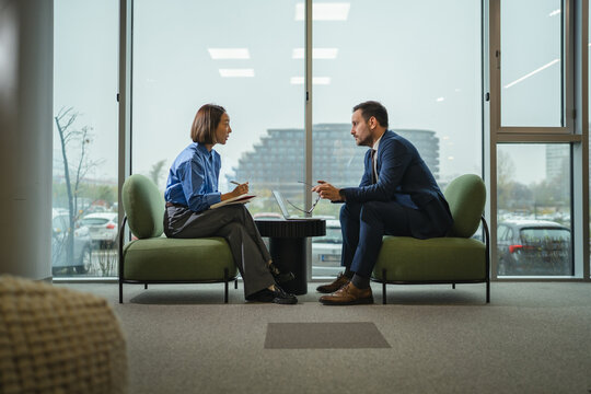 Business people discussing during a corporate meeting in modern office