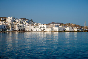 Fototapeta premium View of the harbour of Naoussa, a traditional white-washed, sugar cube, fishing village on the greek island of Paros in the Cyclades
