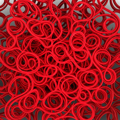 Close-up view of a tangled, vibrant red, three-dimensional, abstract, looping, and intertwined network.