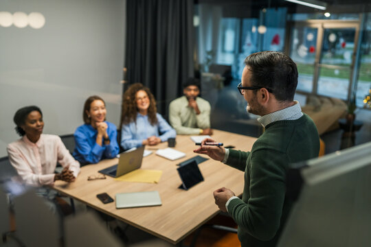 Business team collaborating in a meeting presentation
