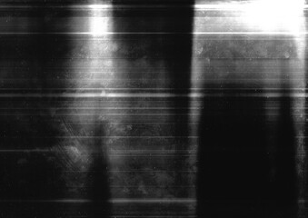 Abstract light streaks on black screen. Grunge rough surface background. Suitable for film grain backdrop, overlay design, or poster design.
