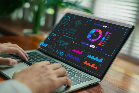 AI-powered analytics dashboard with colorful data charts, global metrics, and digital visualization displayed on a laptop, representing business analysis, performance insights, KPI tracking.