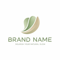Fototapeta premium Elegant organic leaf logo design for a natural beauty brand.