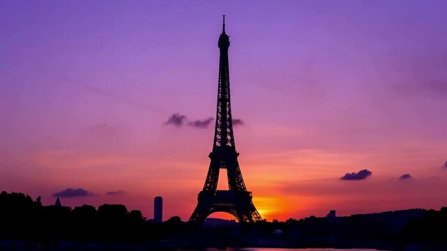 Eiffel tower silhouette at dusk in Paris cinematic footage of iconic french landmark under vibrant sunset in captivating scenic travel clip