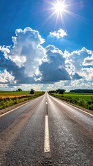 Straight road under blue sky clouds