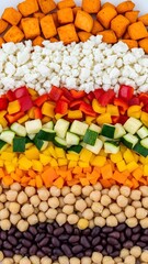 Fototapeta premium Colorful food composition with various healthy ingredients arranged. Vegetarian, organic and balanced diet for culinary creativity. Focus on fresh vegetables and legumes.