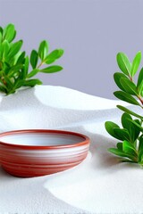 A ceramic bowl rests on a bed of white sand, framed by fresh green leaves, creating a minimalist and serene composition.