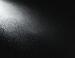 黒い壁に光が差し込んでいる背景素材