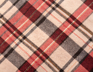 赤いタータンチェックの布の背景テクスチャ