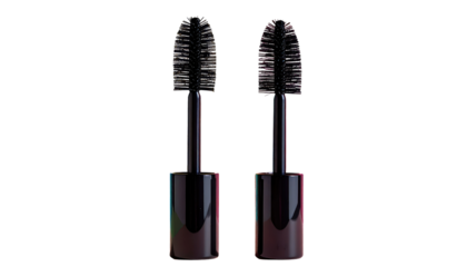 Two mascara brushes close-up against a black background, cosmetic beauty tools with textured bristles