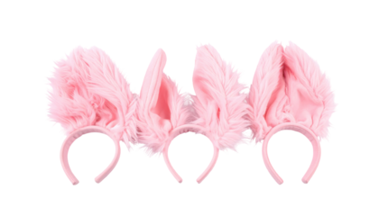 Three pink faux fur headbands with fluffy, pointed ears, on black backdrop in a symmetrical display
