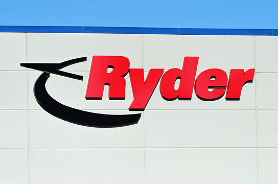 A Ryder System, Inc. sign and logo on the side of a distribution wharehouse in southwest suburban Chicago. Ryder was founded in 1933 by James Ryder, in Miani, Florida.