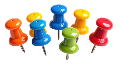 Colorful collection of push pins, arrayed randomly against stark black background, with needles pointing down