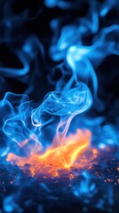 blue flames of fire on black background close-up, abstract background