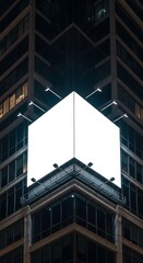 Obraz premium Modern Urban Building with Blank Illuminated Billboard at Night.
