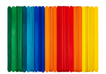 Colorful craft sticks arranged in a rainbow pattern isolated on transparent background